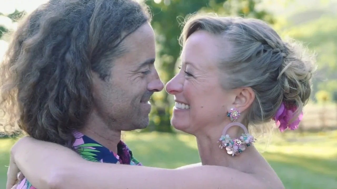 Jenna and Sean laughing together after the ceremony in Cabarete